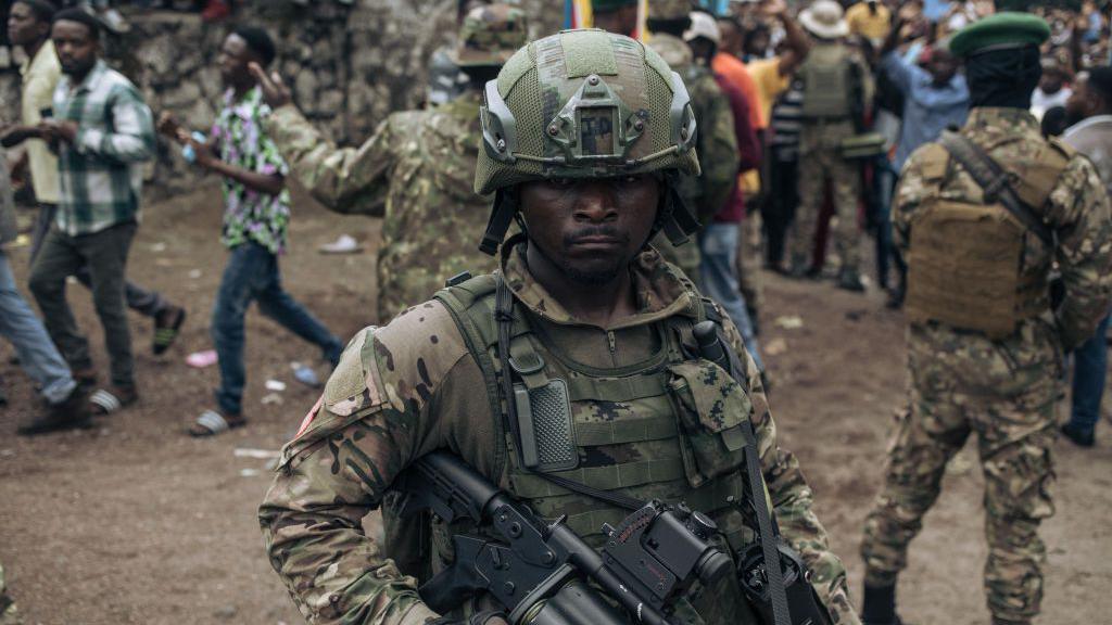 M23 soldiers are seen at the Stade de l'Unite (Unity Stadium in French) in Goma on February 6, 2025 for a public gathering called by the armed group.