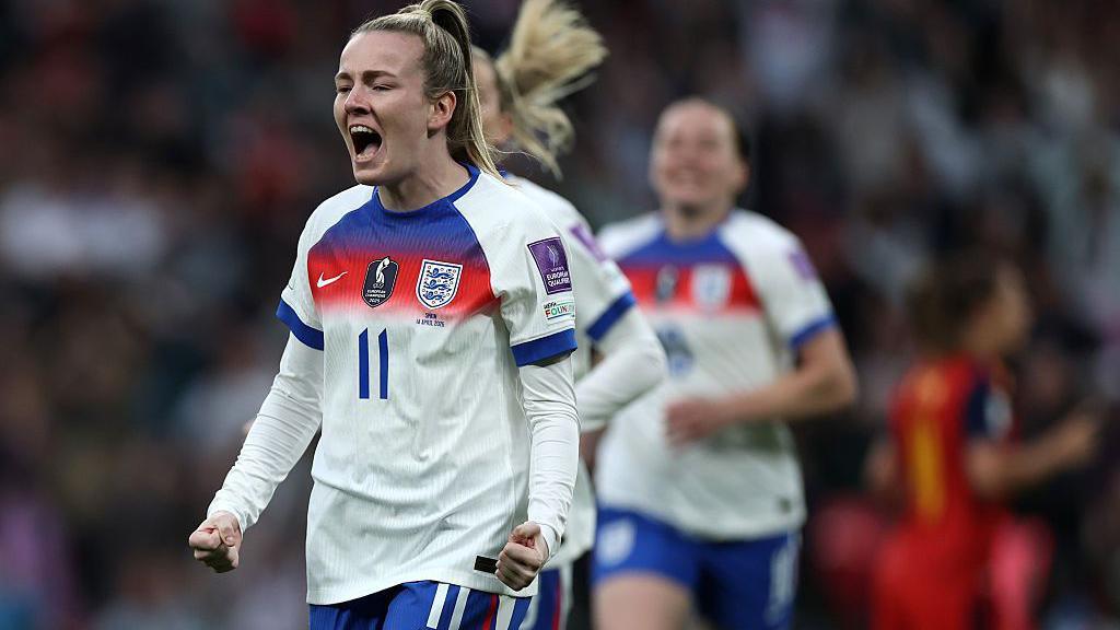 Lauren Hemp celebrates scoring for England