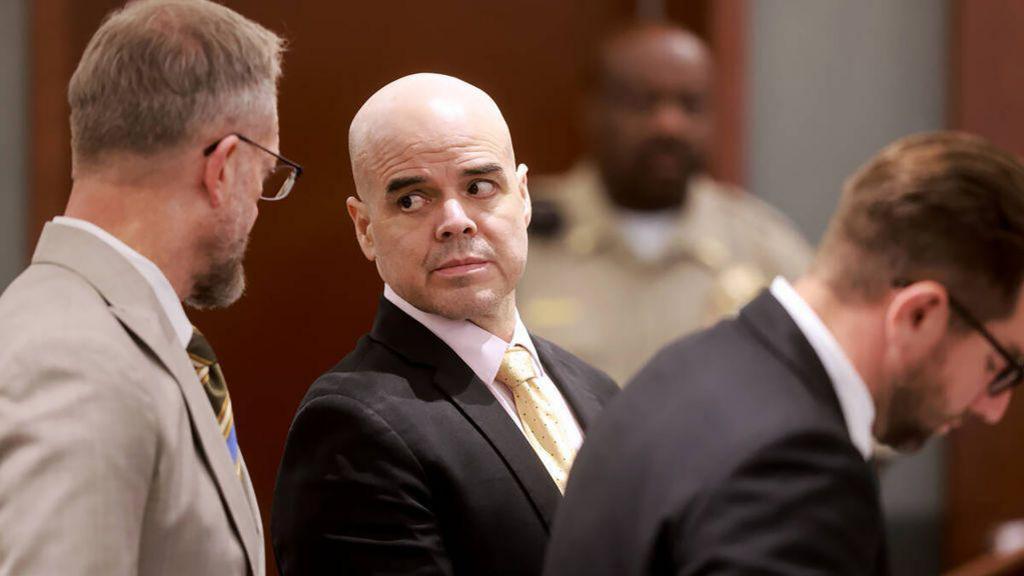 Robert Telles, center, is flanked by his attorneys Robert Draskovich, left, and Michael Horvath during his murder trial at the Regional Justice Center in Las Vegas Friday, Aug. 23, 2024