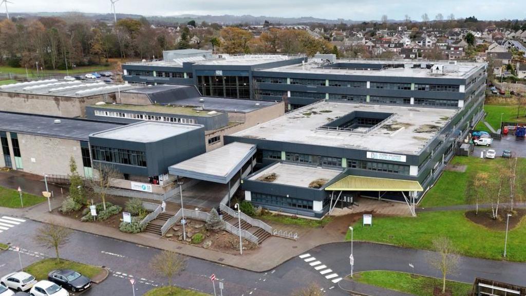 A large Dundee and Angus College building with flat roofs