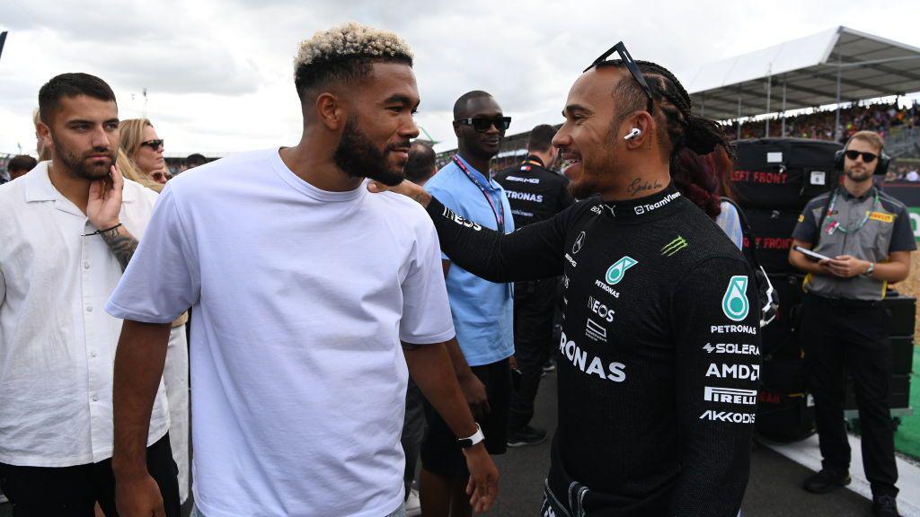 Lewis Hamilton meets footballer Reece James during the British GP
