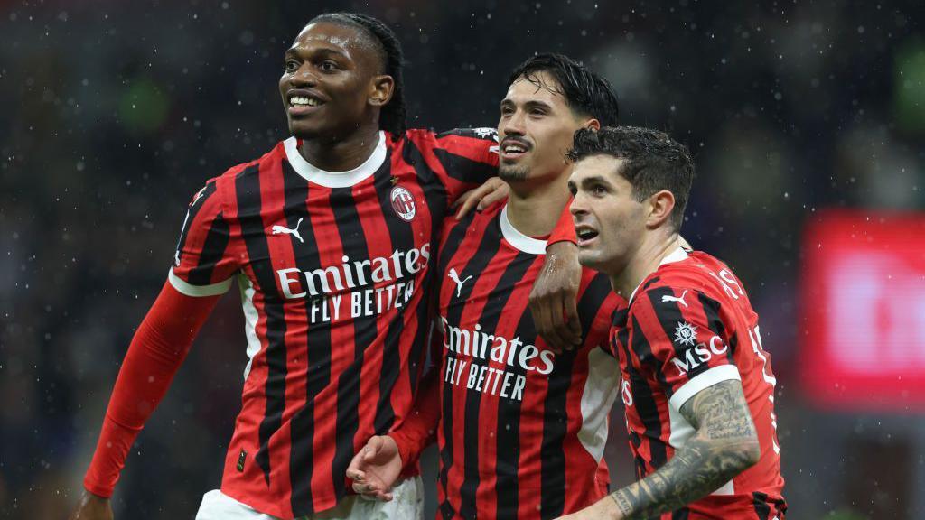  Tijjani Reijnders celebrates a goal for AC Milan with Christian Pulisic and Rafael Leao