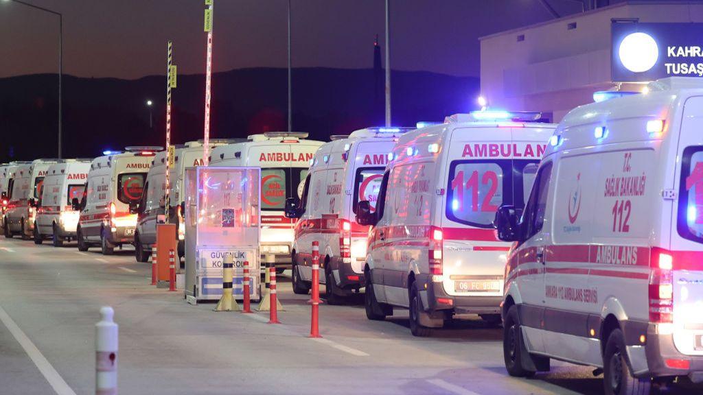 Ambulances wait outside the Turkish Aerospace Industries Corporation (TAI) facilities in Kahramankazan