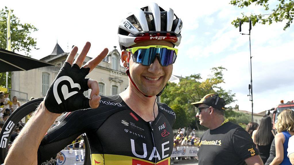 Tim Wellens smiles after claiming victory on stage 15 of the 2025 Tour de France