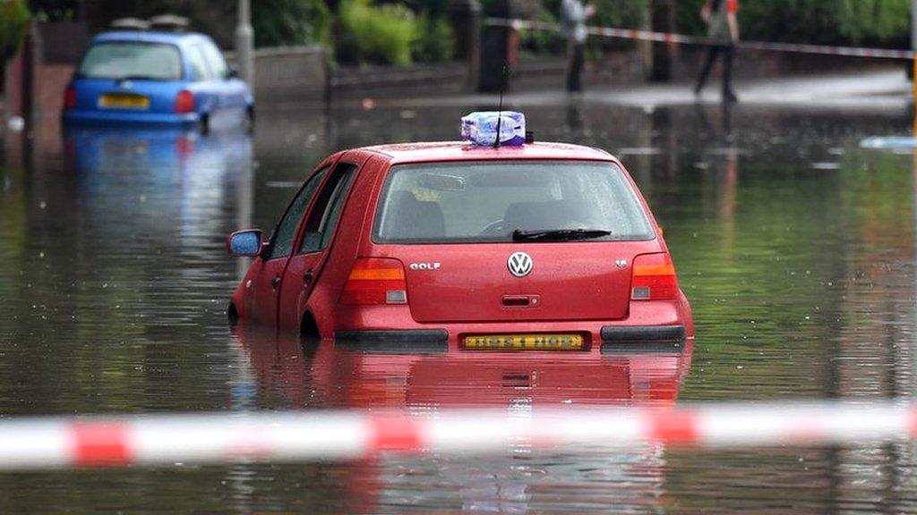 car-stuck-in-floods