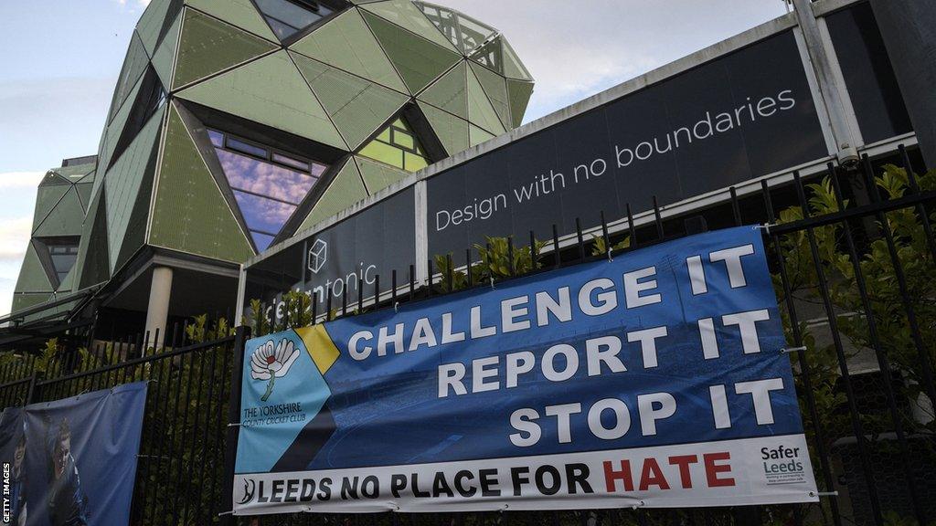 A view of the outside of Headingley with a banner that reads: 'Challenge it, report it, stop it. Leeds no place for hate'