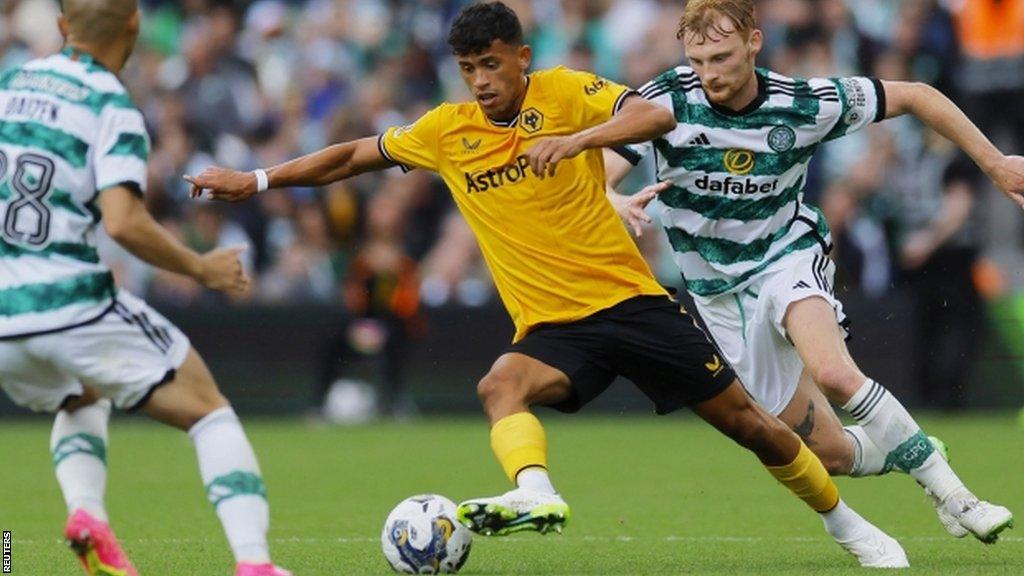 Matheus Nunes playing for Wolves against Celtic