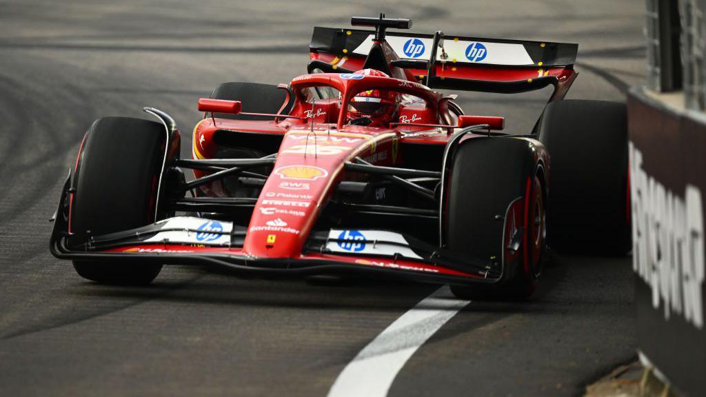 Ferrari's Charles Leclerc slides the car in Singapore Grand Prix first practice