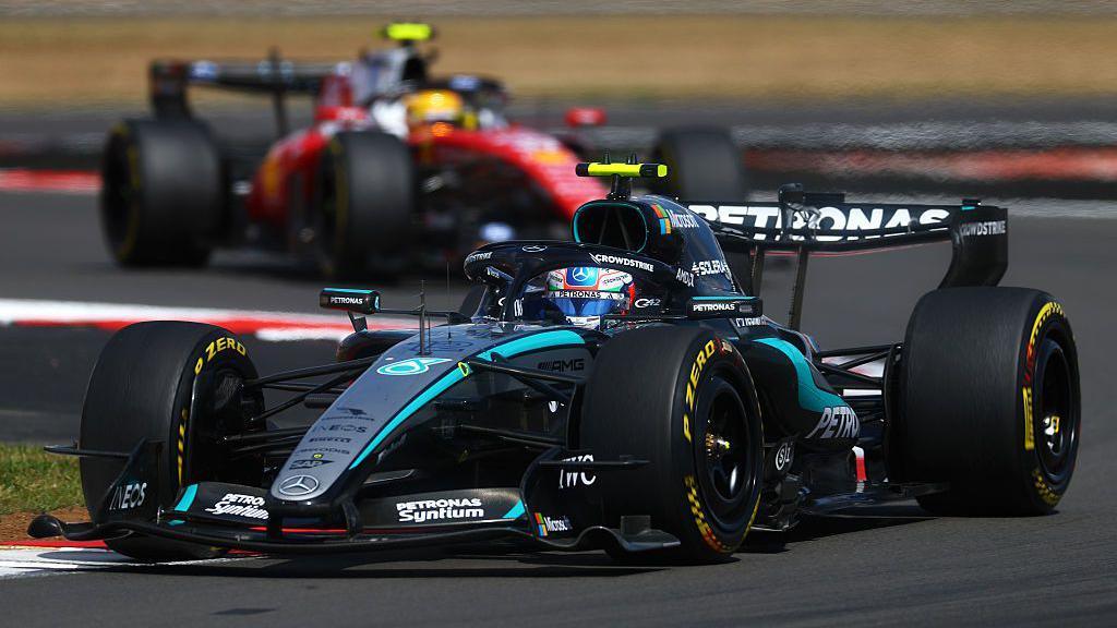 Kimi Antonelli drives ahead of Lewis Hamilton during the British GP sprint race in July