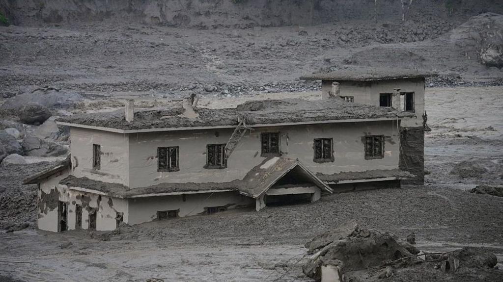 Building submerged in mud in Nepal