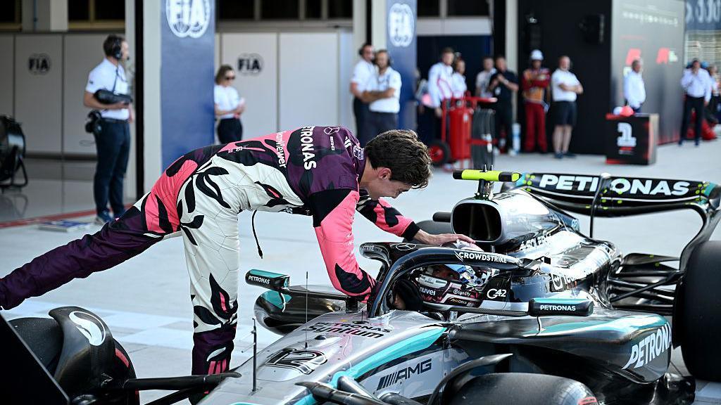 George Russell congratulates Kimi Antonelli on his pole position