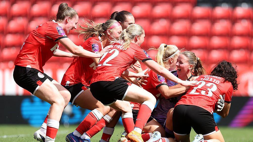 Charlton celebrating