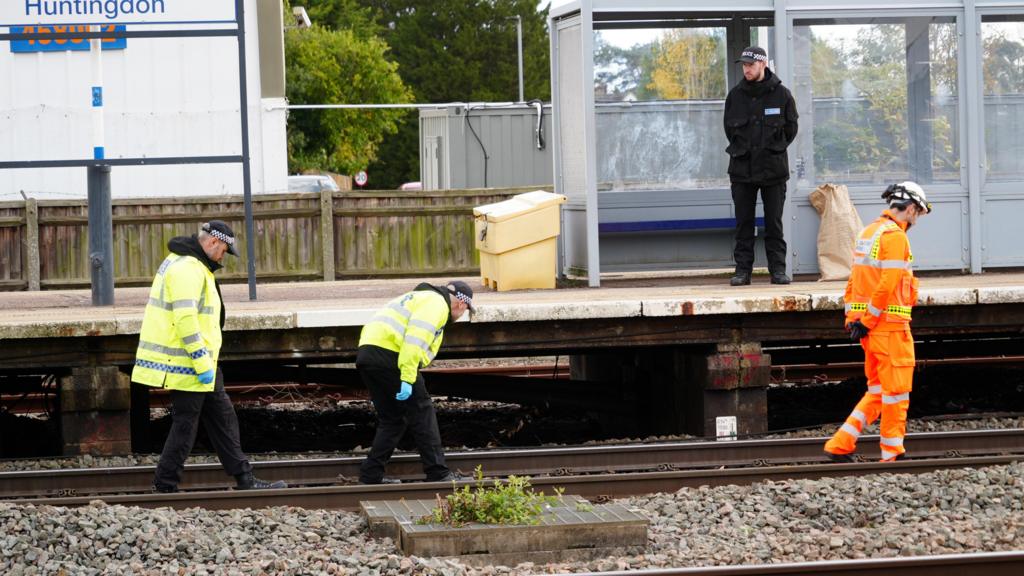 Police search railway line at Huntingdon station
