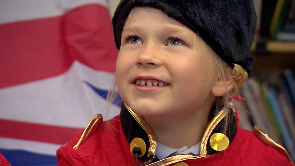 Little girl in beefeater outfit