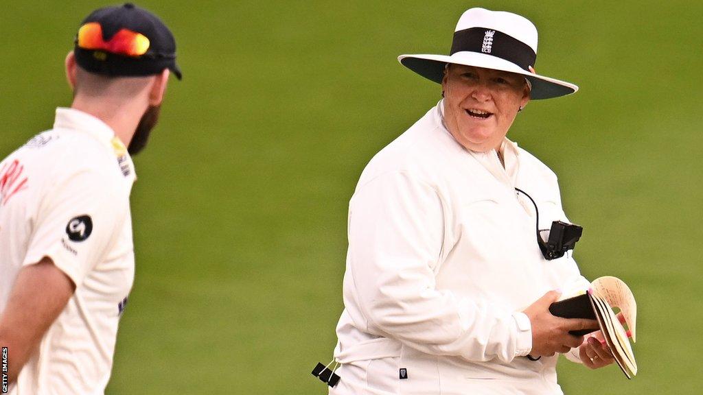 Match Umpire Sue Redfern interacts with Jamie McIlroy of Glamorgan