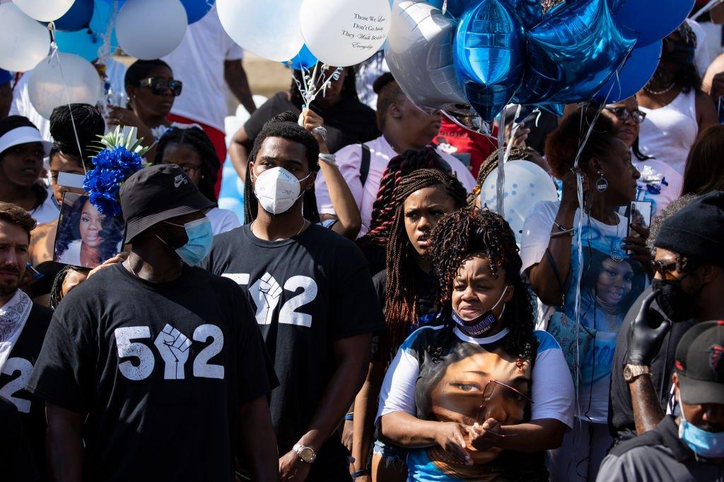 Image of Breonna Taylor's mother at a vigil in Louisville, Kentucky on 5 June