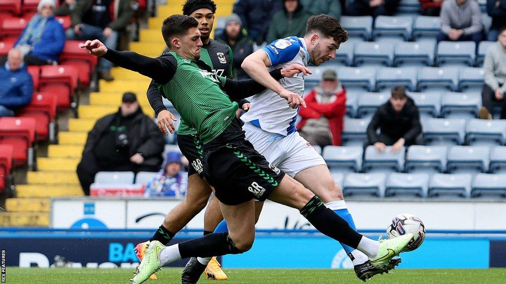 Blackburn Rovers midfielder Joseph Rankin-Costello (11) and Coventry City defender Bobby Thomas battle for possession during the EFL Sky Bet Championship match between Blackburn Rovers and Coventry City at Ewood Park, Blackburn