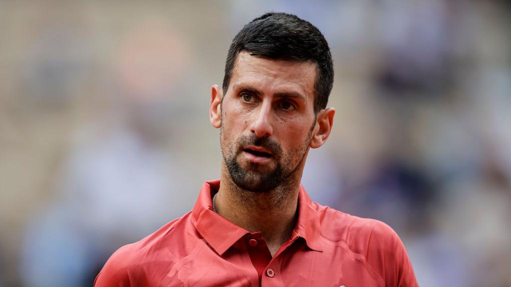 Novak Djokovic looks on during a match at the 2024 French Open.