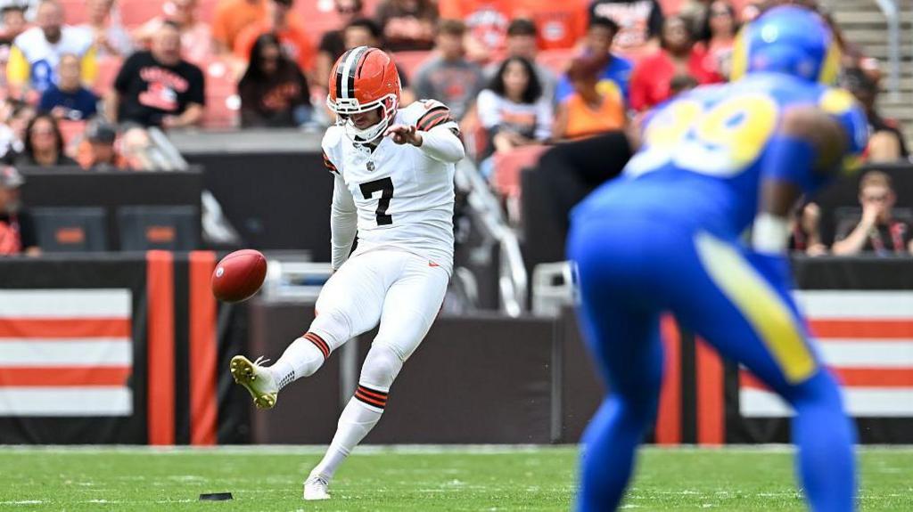 Dustin Hopkins taking kick-off