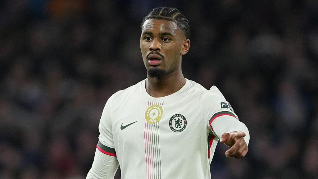 Jorrel Hato pointing while playing for Chelsea against Cardiff City in the Carabao Cup