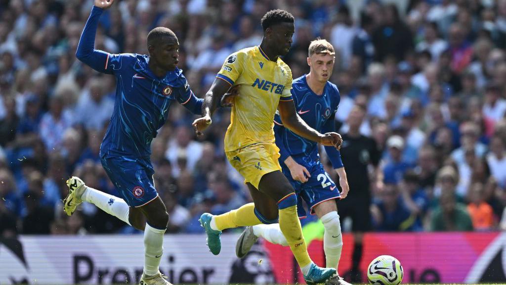 Nicolas Jackson and Cole Palmer chase Marc Guehi as Crystal Palace play Chelsea at Stamford Bridge
