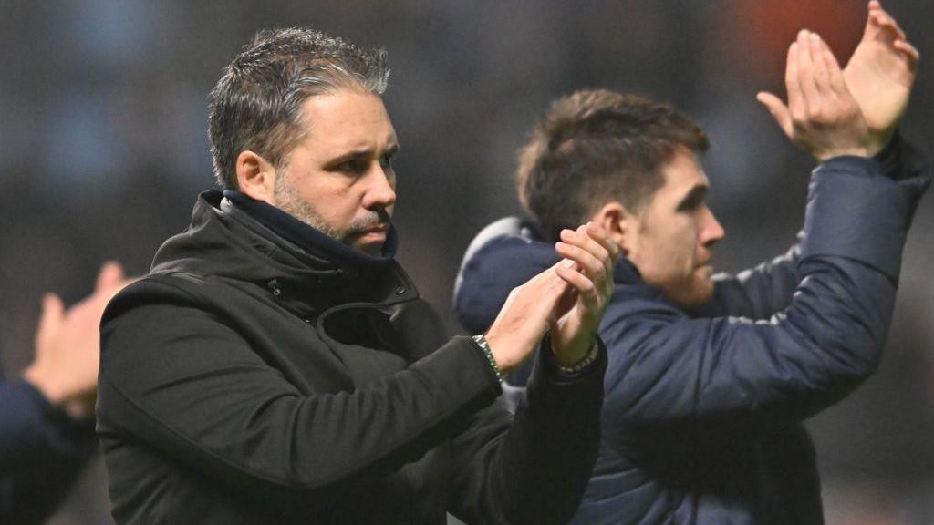 Marti Cifuentes applauds the QPR fans after defeat at Coventry City