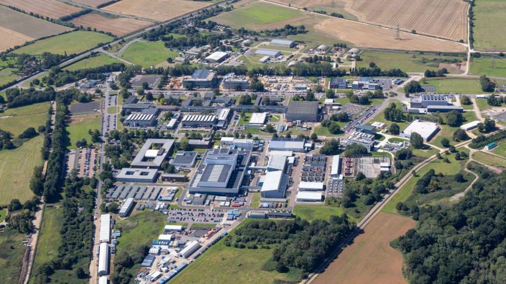 In an aerial view, Culham Science Centre, a research and development facility on August 23, 2023, in South Oxfordshire. The picture is taken on a sunny day and there are many large buildings surrounded by countryside 