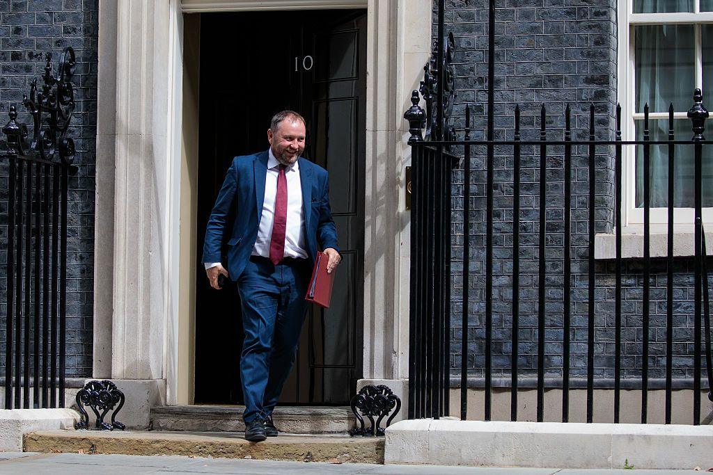 MP Ian Murray leaves 10 Downing Street wearing a blue suit, white shirt and red tie