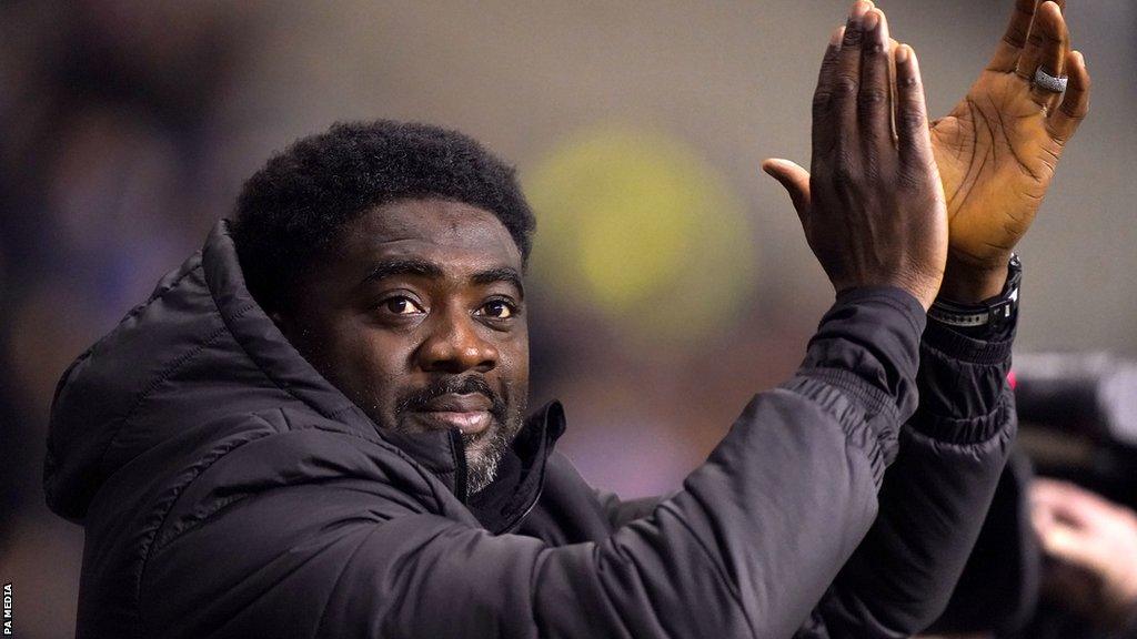 Kolo Toure applauds