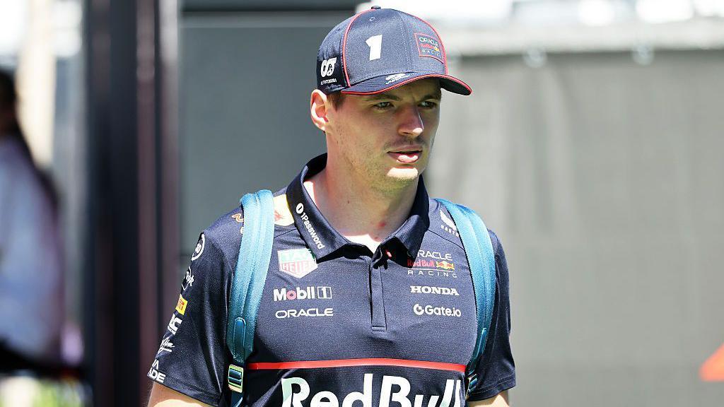 Max Verstappen looks on