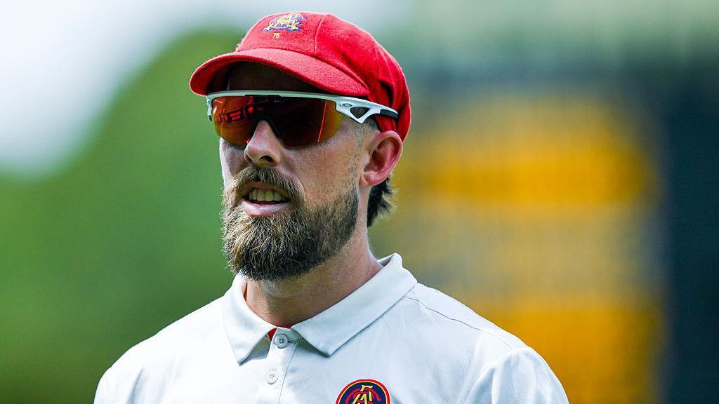 Jake Lehmann pictured wearing sunglasses