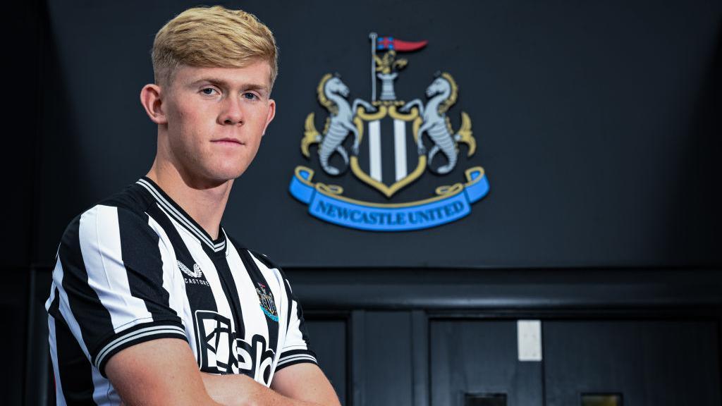 Newcastle United: Lewis Hall 'honoured and very proud to wear this shirt' -  BBC Sport