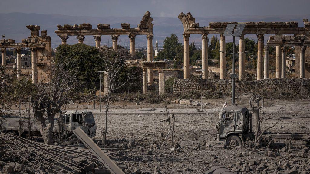 Rubble and a burnt-out truck in the site next to Roman ruins hit by an IDF bomb on 6 November