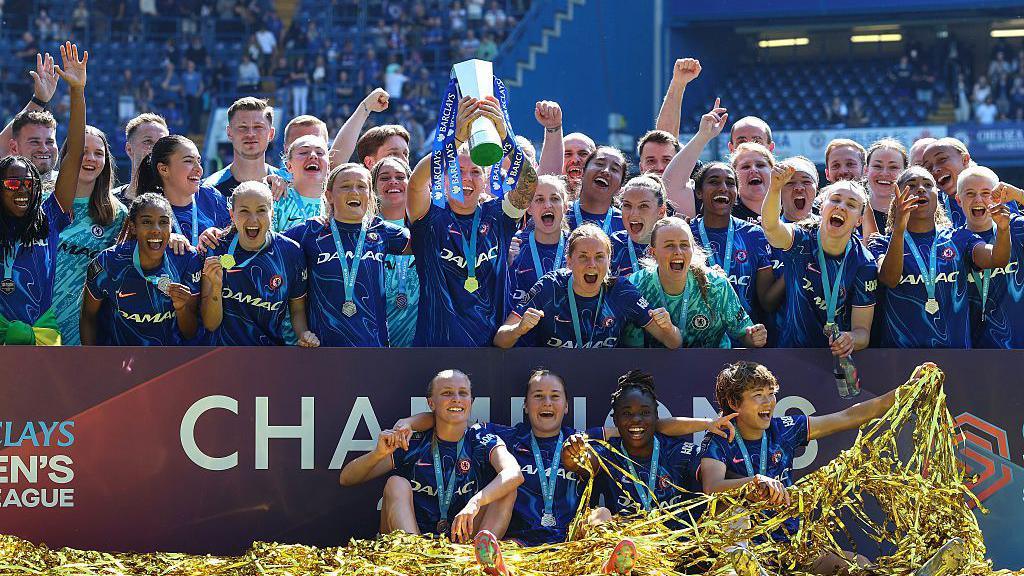 Chelsea lifting the WSL trophy in 2025.
