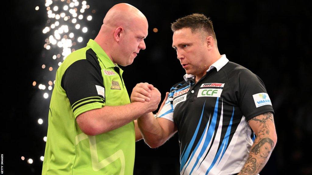 Michael van Gerwen and Gerwyn Price shake hands