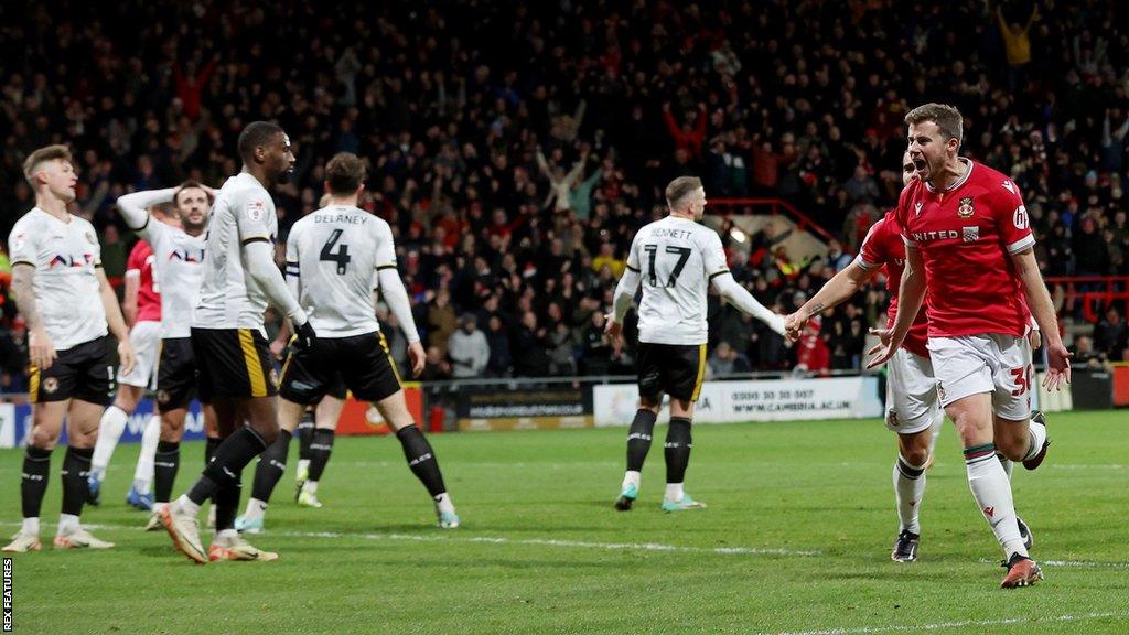 Wrexham player James Jones celebrates