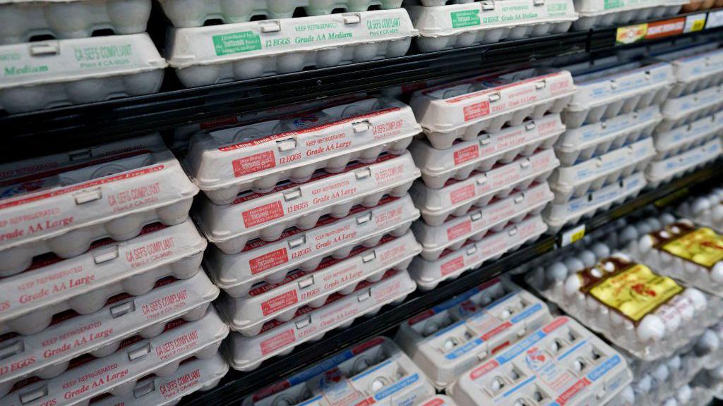 Cartons of eggs on shelves at a California grocery store 