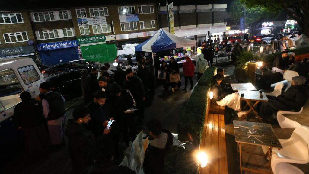 People visiting a Birmingham Ramadan event 