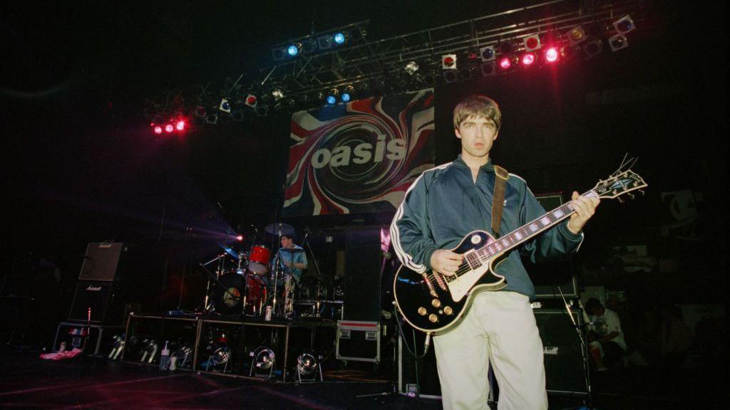 Oasis playing a concert