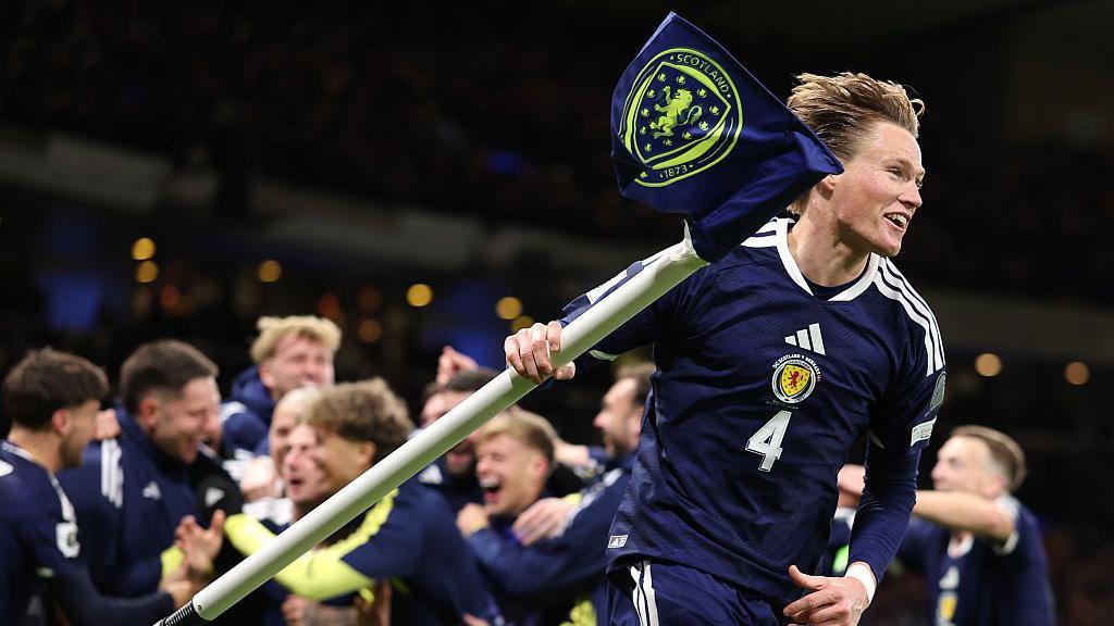 Scott McTominay celebrating during Scotland's match against Denmark in November 2025.