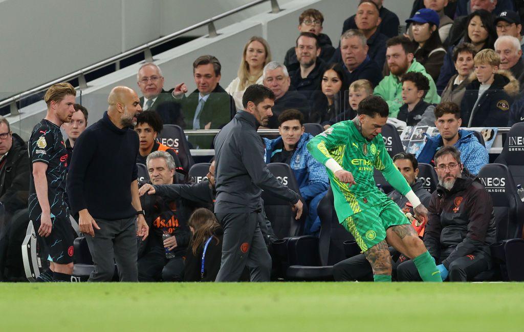 Ederson appears to kick cool box