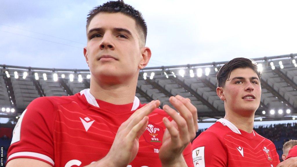 Joe Hawkins and Louis Rees-Zammit applaud Wales fans