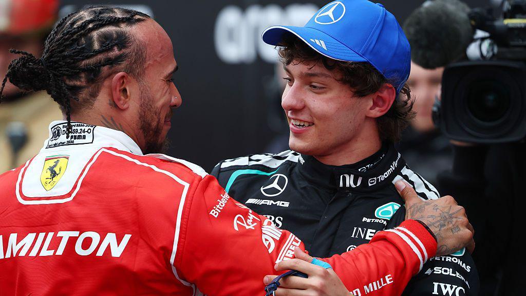 Lewis Hamilton and Kimi Antonelli hug after the Canadian Grand Prix 