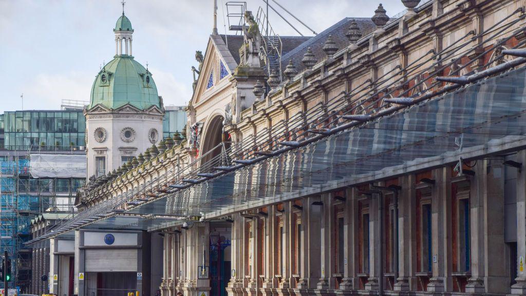 General view of the market - an exterior shot taken in the early morning with sun falling on the building's façade.