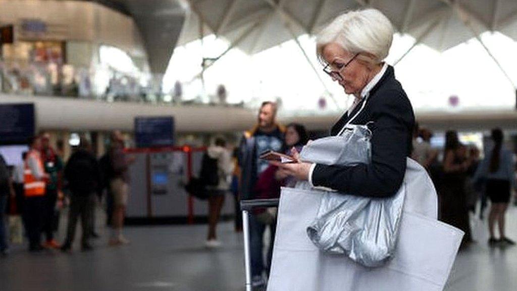 A traveller at Kings Cross station on June 25, 2022