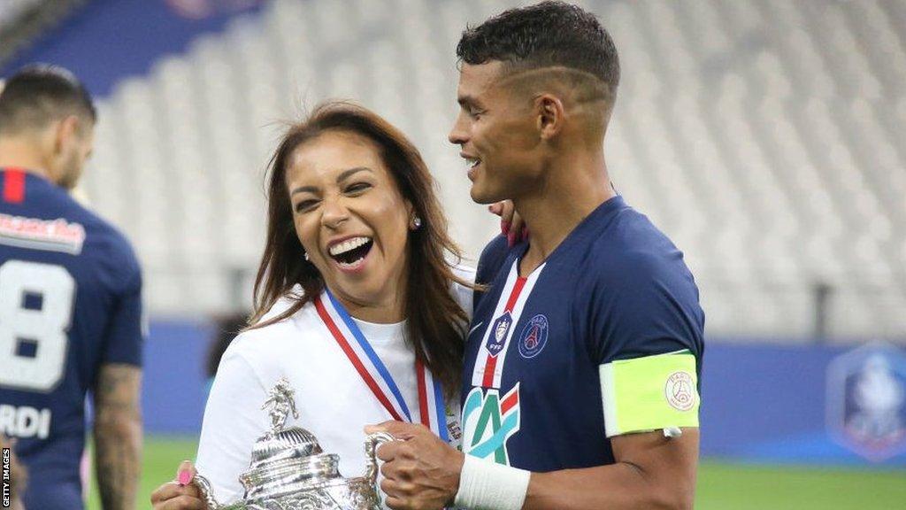 Thiago Silva of PSG and his wife Isabele da Silva celebrate