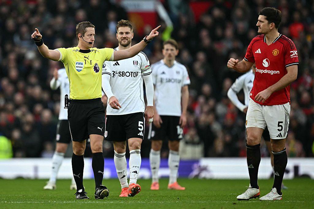 Referee John Brooks indicated that a Fulham goal has been ruled out for offside after a VAR check