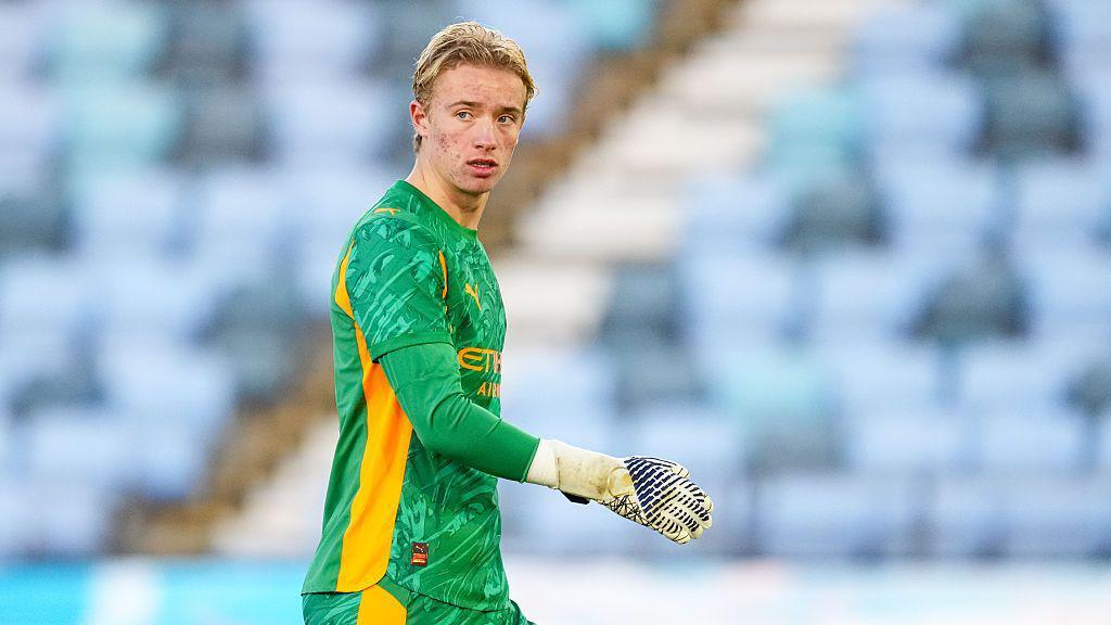 Manchester City U19 goalkeeper Spike Brits looks on during a UEFA youth league match against Bayer 04 Leverkusen U19 at Joie Stadium in Manchester in November 2025 