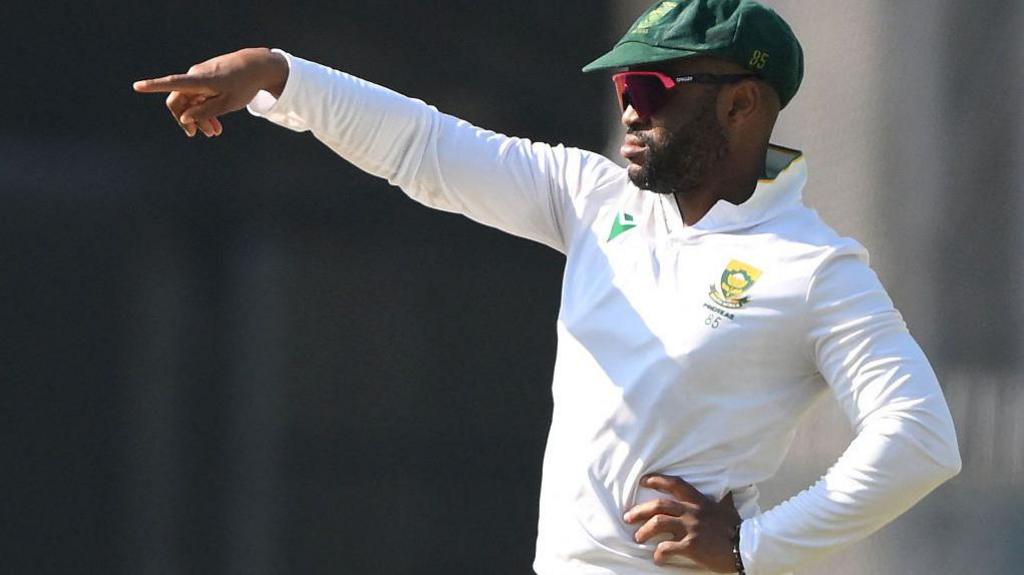 South Africa's captain Temba Bavuma gestures during the fifth day of the second Test cricket match between India and South Africa at the Barsapara Cricket Stadium in Guwahati on November 26, 2025. (Photo by Biju BORO / AFP via Getty Images)
