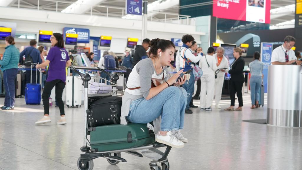 Passengers at Heathrow Airport as disruption from air traffic control issues continues